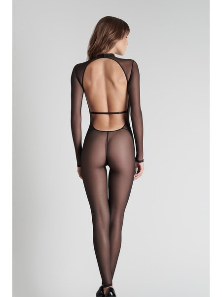 Dos de la combinaison Corps-à-corps en résille transparente. Sa couture fine sur l'entrejambe donne l'impression de porter un string ficelle.