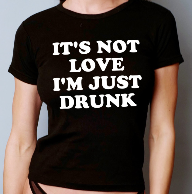 T-shirt noir en coton taille S avec un message humoristique en blanc.